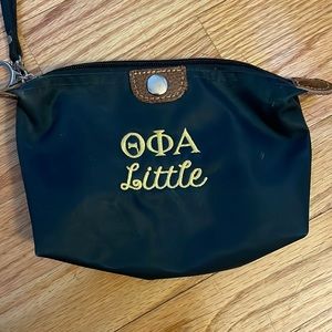 Theta Phi Alpha wristlet
